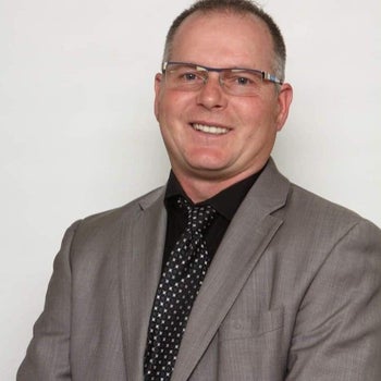 Portrait of Derek Burke, Associate.